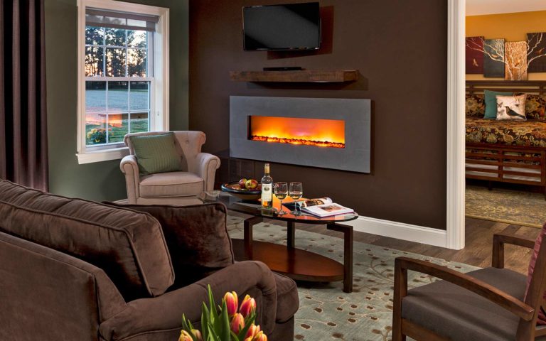 Cozy fire scene in our guest room is perfect for your romantic getaway in Maryland