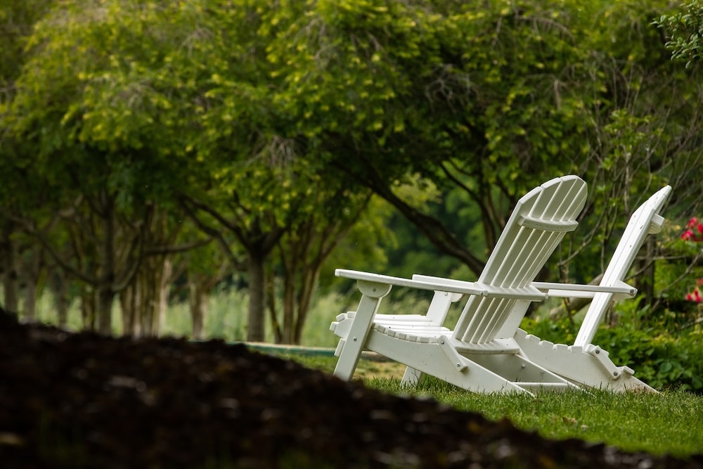 Best Maryland Weekend Getaways Near Philadelphia 8 Two chairs on the scenic grounds of our unforgettable Eastern Shore Bed and Breakfast